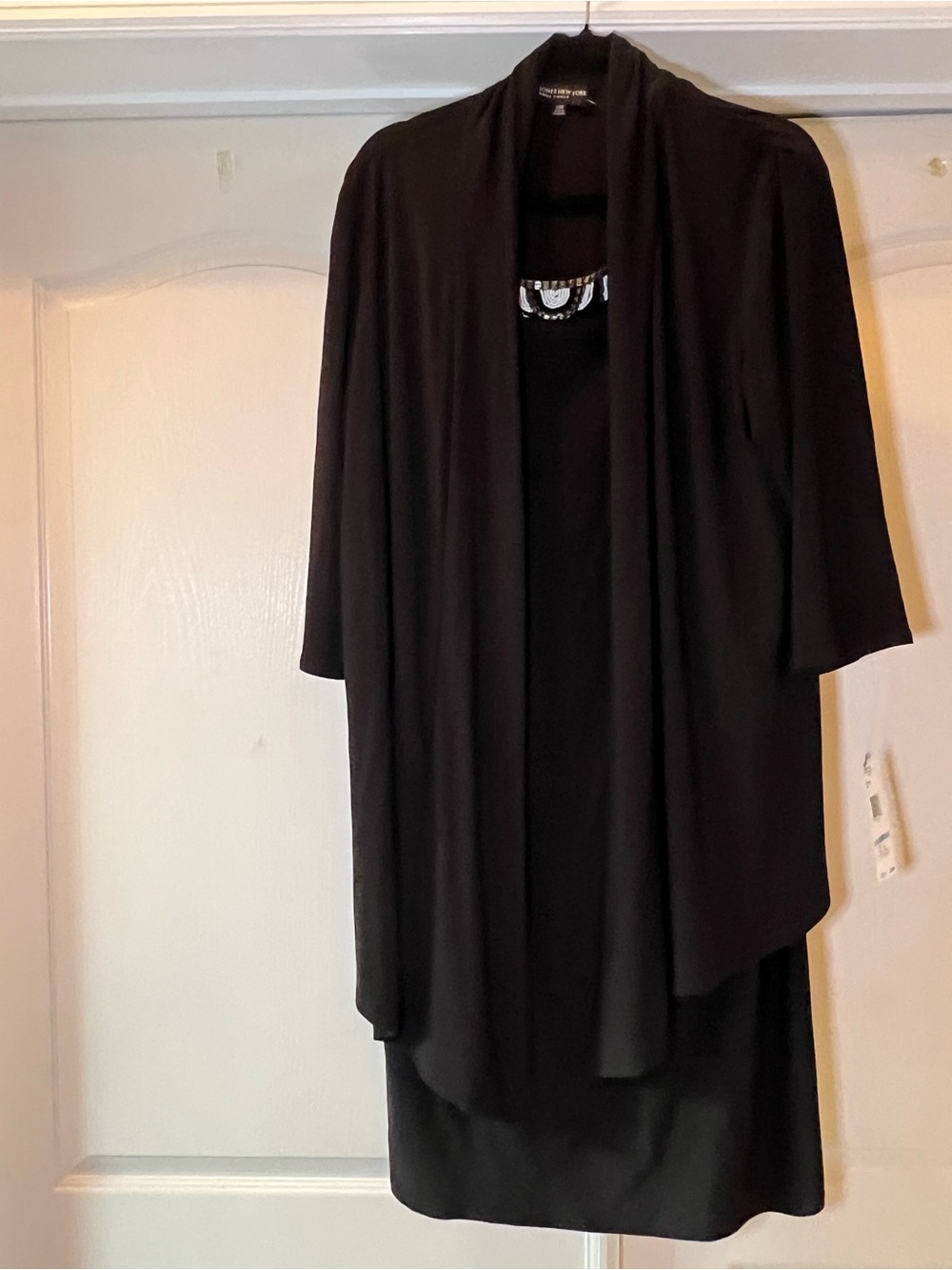 Black Women’s Open-Front Dress with attached Hacjet and beading at the neckline